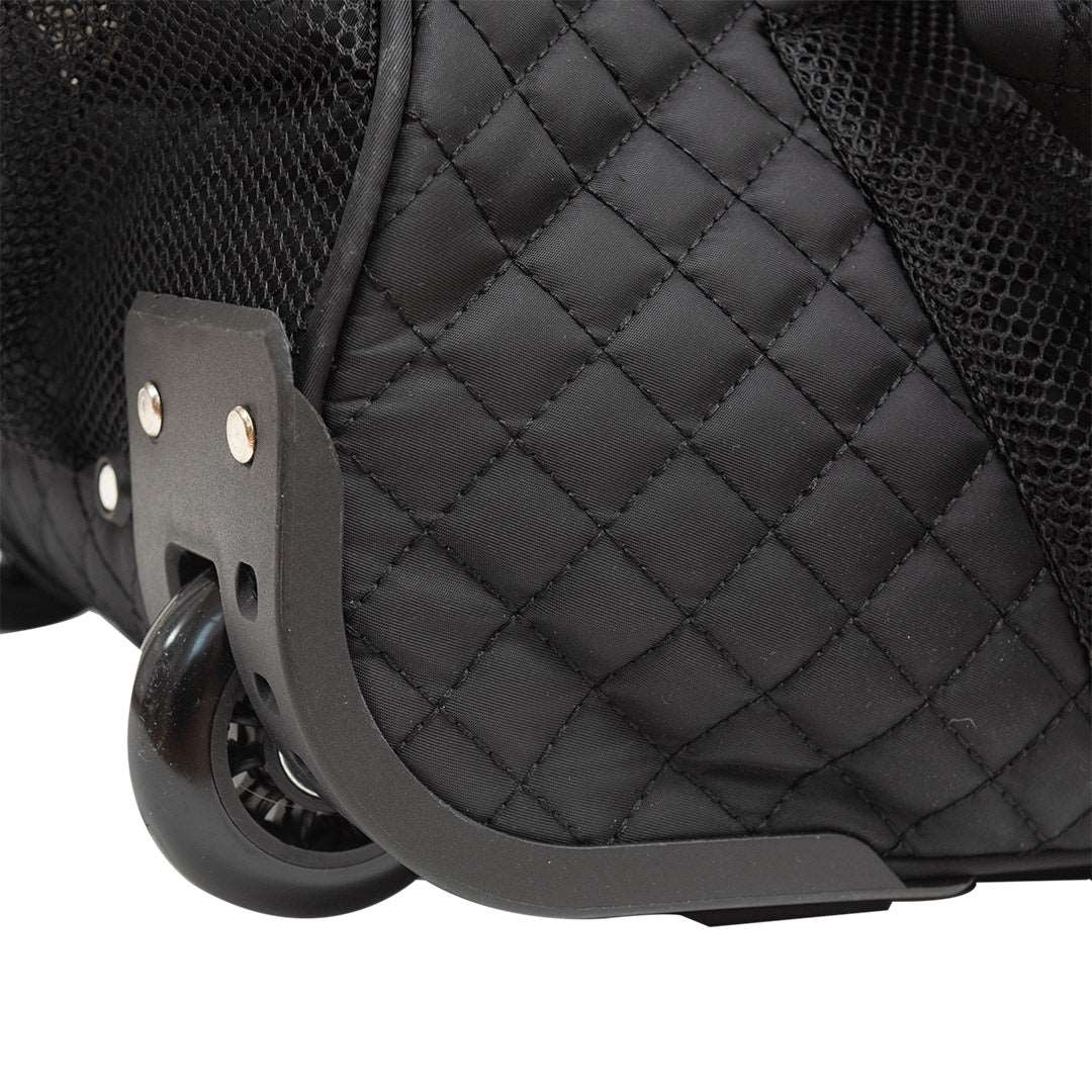 close up of wheels on black yoga carry bag